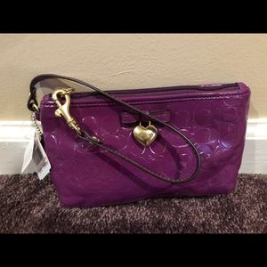 Purple Coach wristlet